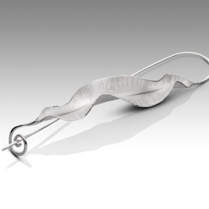 Wave brooch, sterling silver, by Rauni Higson