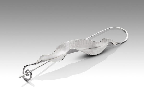 Wave brooch, sterling silver, by Rauni Higson